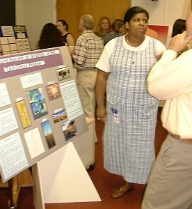 Hilliary Anderson-Cole, a student at Roane State Community College, explaining her poster to a judge.